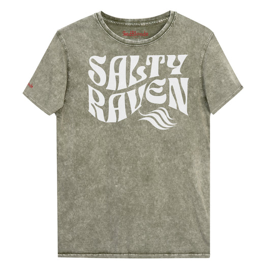 flatlay of unisex relaxed fit soft army green denim wash vintage  graphic t-shirt with the slogan 'Salty Raven' in white retro 70s wavy font. Branded RedBlonde in red on inside neck and right sleeve