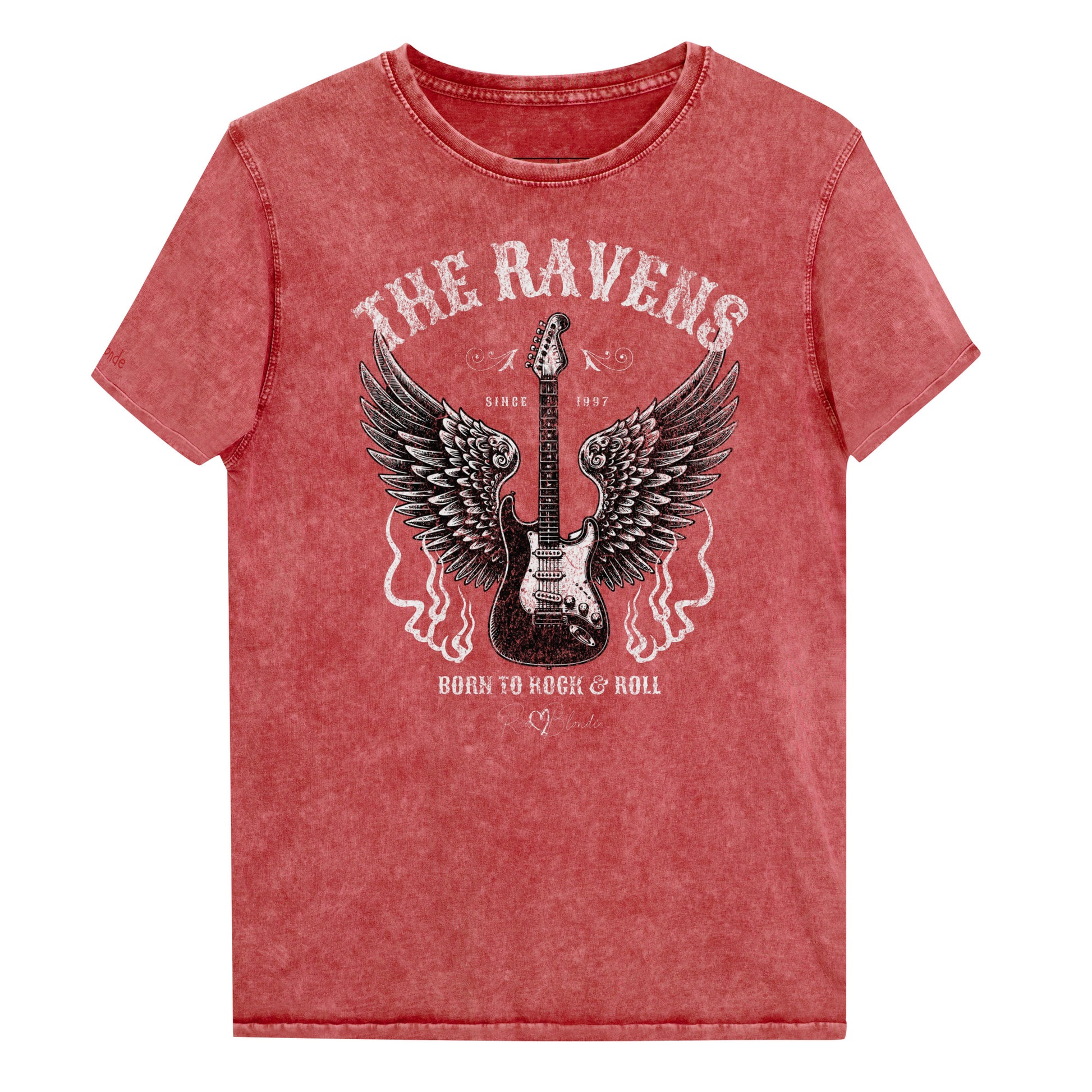 A flatlay of a garnet red denim wash unisex t-shirt with a graphic of a black & white guitar with raven bird wings emerging from the side. The graphic features ‘THE RAVENS’ in Sancreek font in a semicircle above the guitar, while ‘BORN TO ROCK & ROLL’ is underneath. Branded RedBlonde London in inside neck and right sleeve