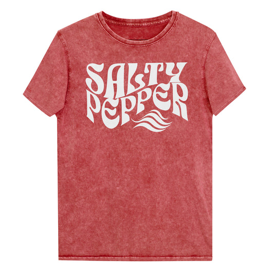 flatlay of unisex relaxed fit soft garnet red denim wash vintage  graphic t-shirt with the slogan 'Salty Pepper' in white retro 70s wavy font. Branded RedBlonde in red on inside neck and right sleeve