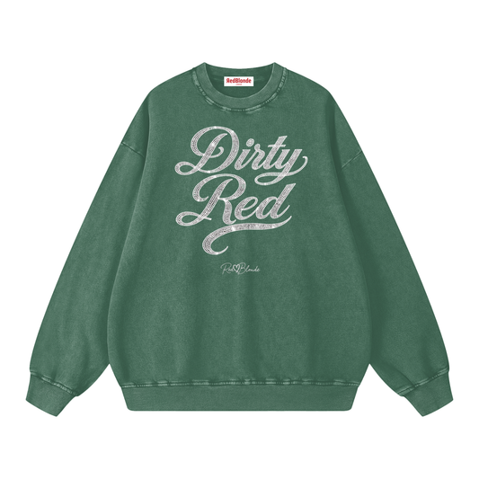 green snow-wash oversized sweatshirt with a drop-shoulder fit, featuring a rhinestone-style “Dirty Red” Milkstore script graphic across the front and a small RedBlonde logo near the hem.