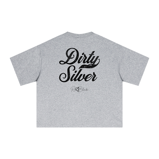 Back view of a grey boxy oversized unisex T-shirt with bold black Milkstore 01 vintage-style script reading “Dirty Silver” and the RedBlonde signature logo beneath
