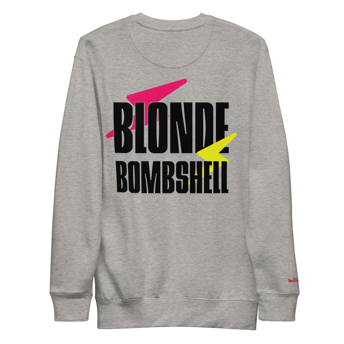 Light grey unisex sweatshirt with bold black Krisha text “BLONDE BOMBSHELL” on the back, accented by a pink lightning bolt through “BLONDE” and a yellow lightning bolt through “BOMBSHELL.”
