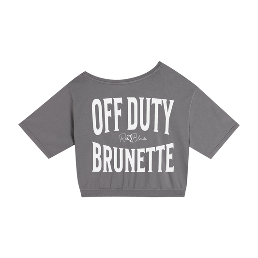 grey asymmetrical boxy T-shirt with white ‘OFF DUTY Brunette"  brookfield text back print and RedBlonde signature logo.”