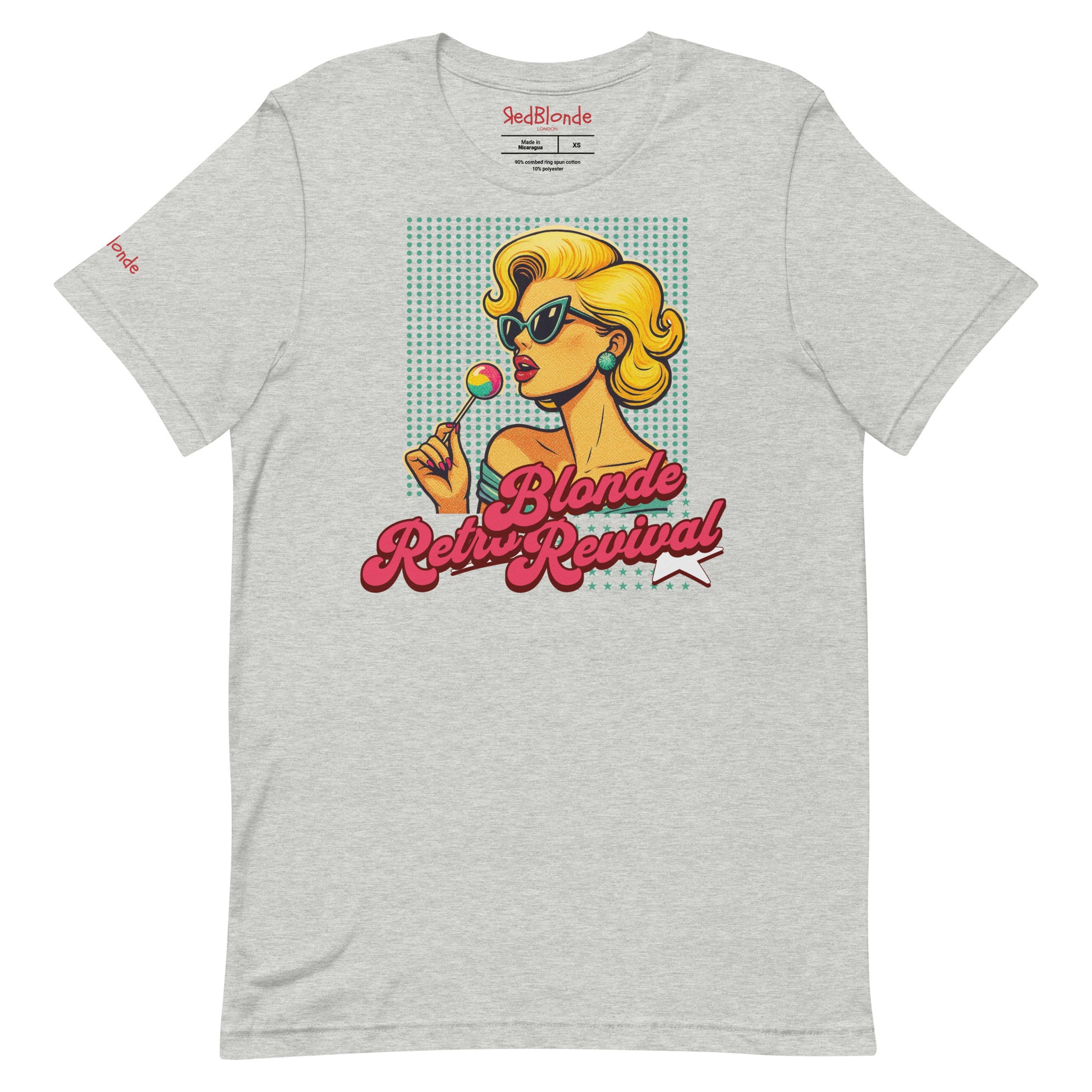 grey unisex t-shirt featuring a vibrant retro pop art illustration of a glamorous blonde woman in sunglasses holding a lollipop, with bold red script text that reads "Blonde Retro Revival." Branded RedBlonde on inside neck and right sleeve 