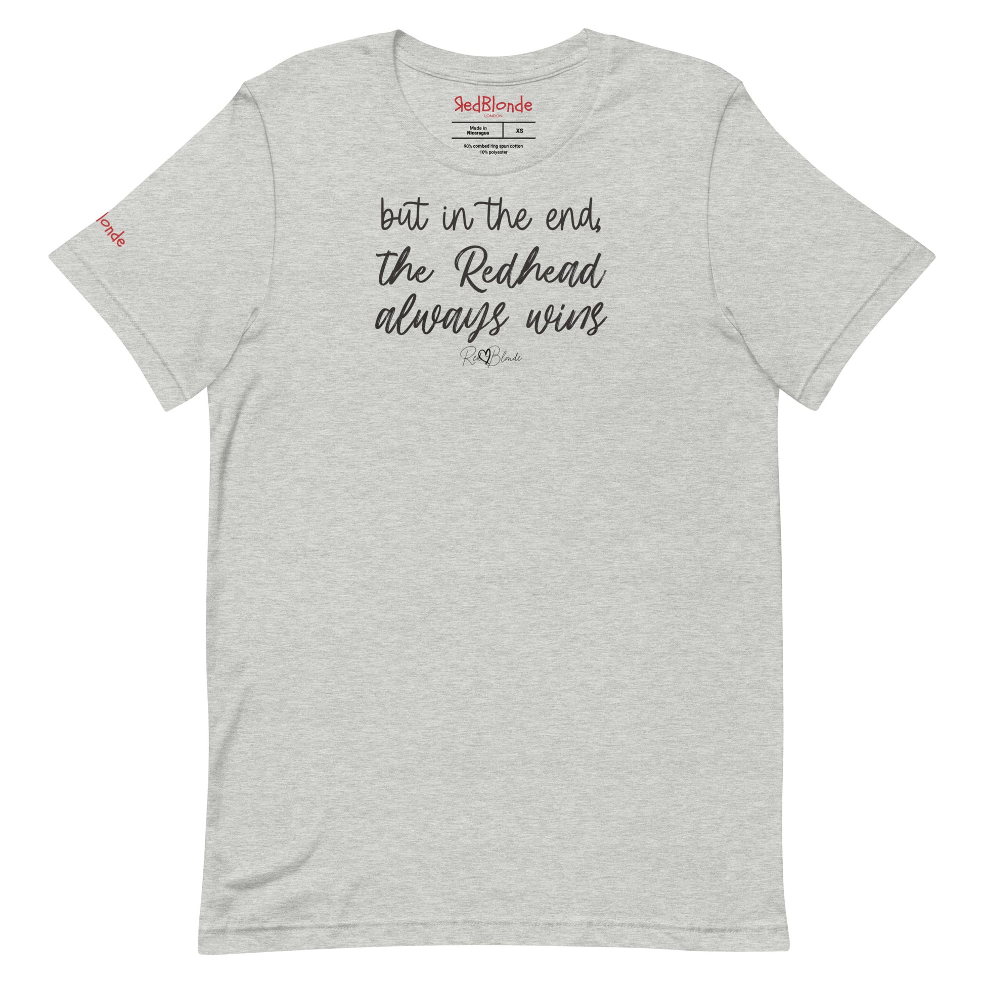 A light grey unisex t-shirt featuring the handwritten-style slogan “but in the end, the Redhead always wins” in Hillbear font  in dark gray text across the chest, signed off RedBlonde. Branded “RedBlonde London on inside the collar and on the right sleeve