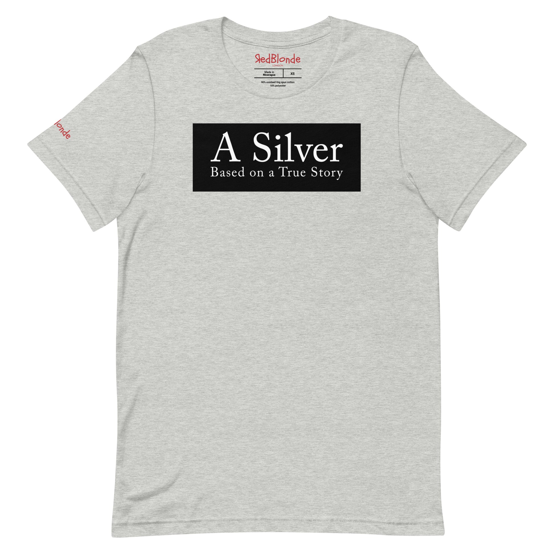 flatlay of a heather athletic grey unisex relaxed fit t-shirt with the slogan 'A Silver - Based on a True Story' in white text in a black box graphic. Branded RedBlonde London in red on inside neck and right sleeve