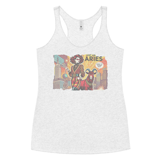Flatlay of a heather white soft racerback tank t-shirt with a retro pop-art Aries graphic featuring a redhead woman, wearing a belted catsuit and high boots with one hand in her pocket, with a ram by her side and a city backdrop, captioned ‘Just an Aries, born to stand out'
