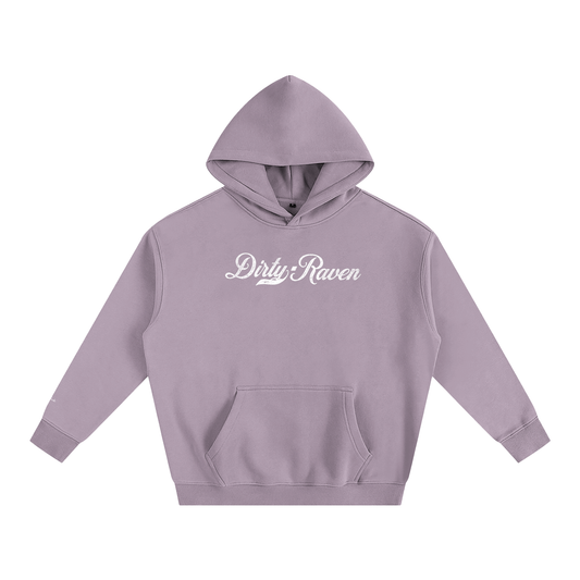 A lavender pullover hoodie laid flat on a white background. It has a kangaroo front pocket and ribbed cuffs and hem. Across the chest is white Milkstore 01 script text reading “Dirty Raven.”