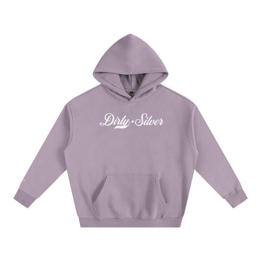 A lavender pullover hoodie laid flat on a white background. It has a kangaroo front pocket and ribbed cuffs and hem. Across the chest is white Milkstore 01 script text reading “Dirty Silver"