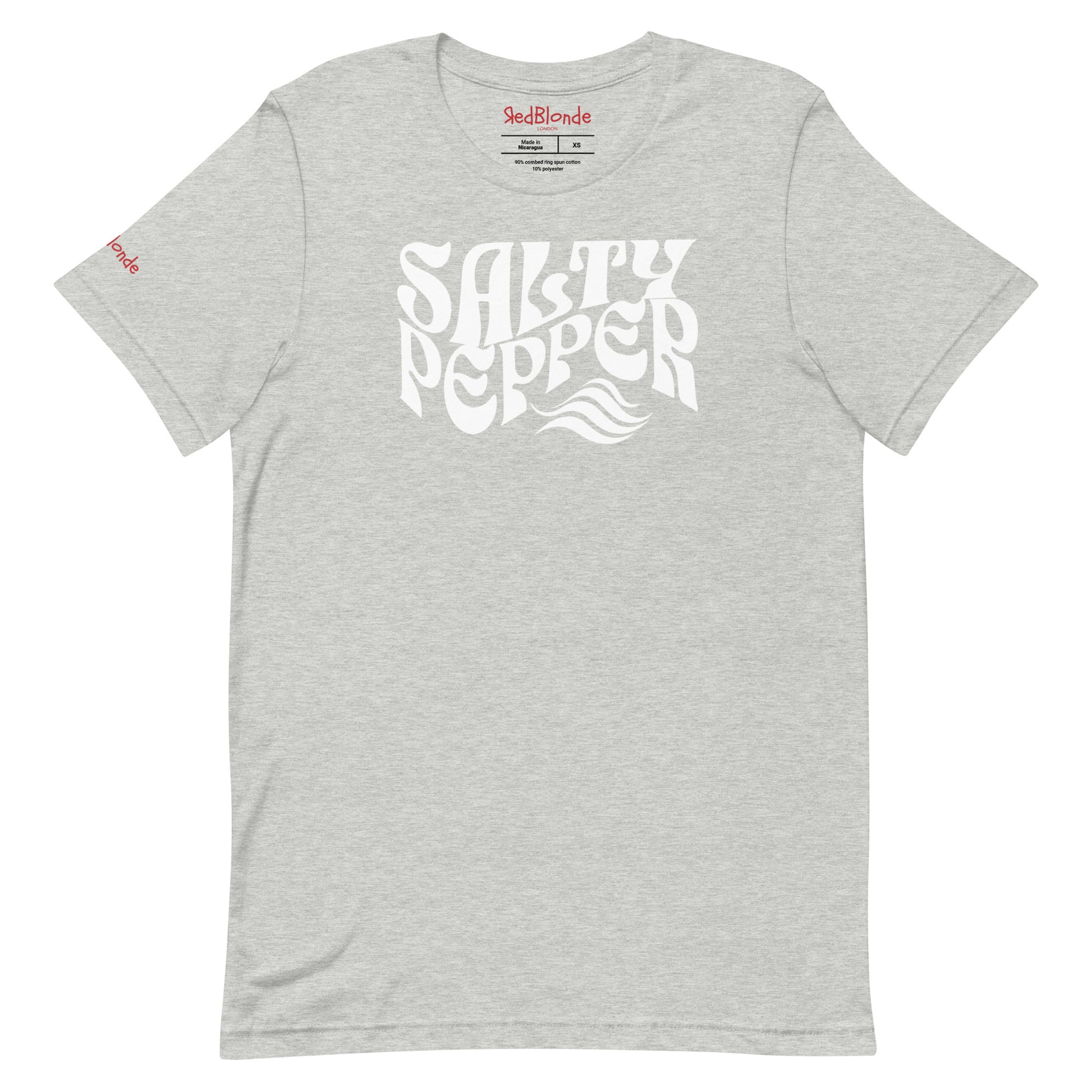 flatlay of light gray classic unisex graphic t-shirt with the slogan 'Salty Pepper' in Solino Display white retro 70s wavy font. Branded RedBlonde in red on inside neck and right sleeve