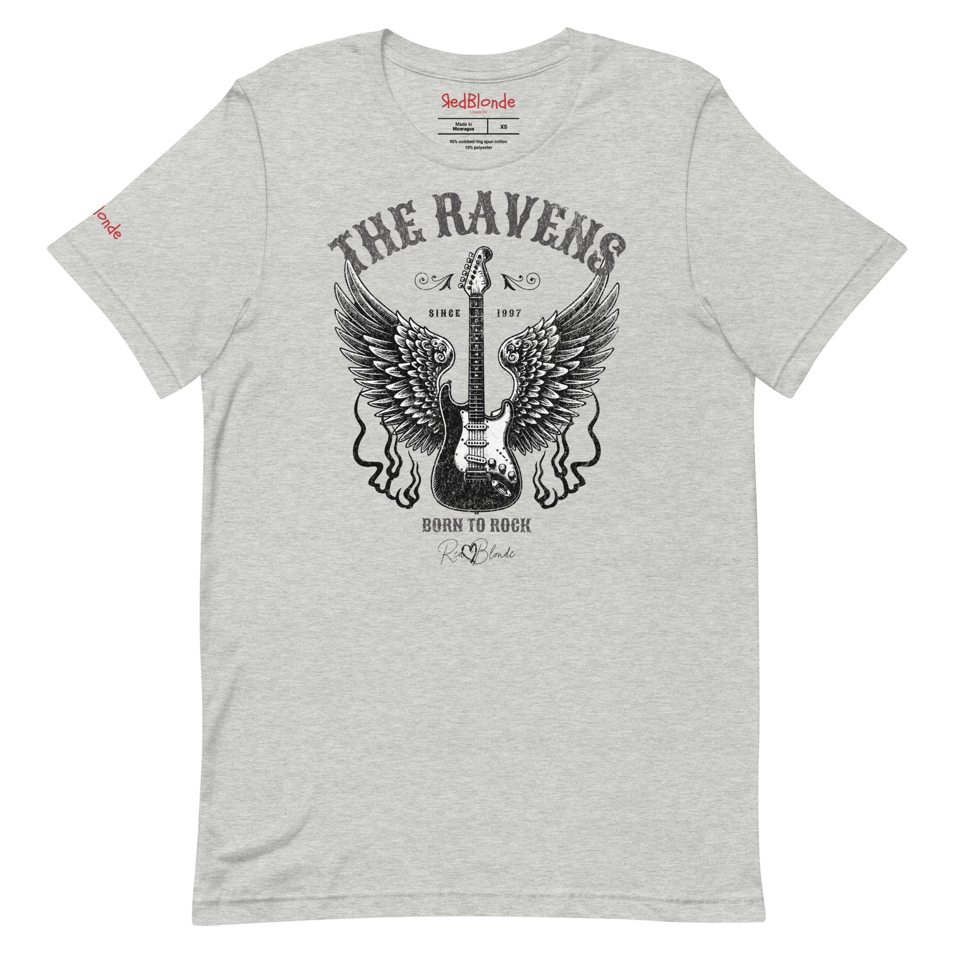 A flatlay of a light grey unisex t-shirt with a graphic of a black & white guitar with raven bird wings emerging from the side. The graphic features ‘THE RAVENS’ in Sancreek font in a semicircle above the guitar, while ‘BORN TO ROCK’ is underneath. Branded RedBlonde London in inside neck and right sleeve