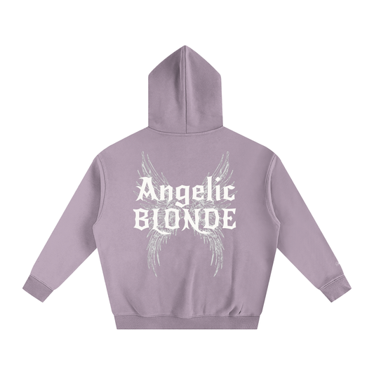 Lilac oversized fleeced hoodie with a back print featuring white gothic “Angelic Blonde” text layered over large angel wing artwork.