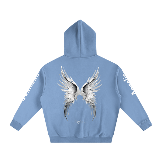 Back view of a mid blue hoodie featuring large silver angel wings printed across the back, with white RedBlonde signature logo underneath. Each sleeve features gothic New Rockstar font graphic text  one sleeve says 'Angelic' and the other 'Redhead' 