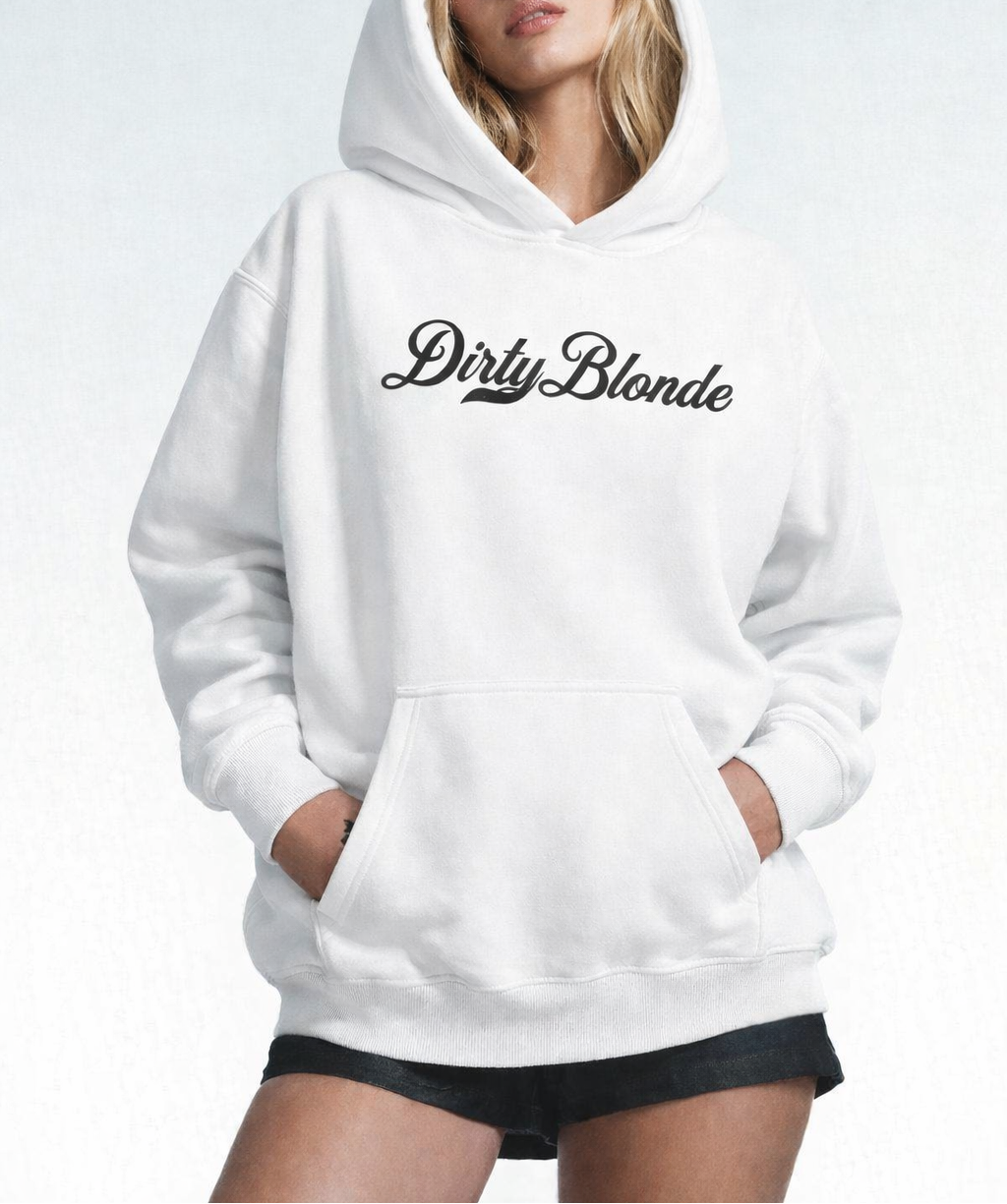 model wears a white pullover hoodie laid flat on a white background. It has a kangaroo front pocket and ribbed cuffs and hem. Across the chest is black Milkstore 01 script text reading “Dirty Blonde.”