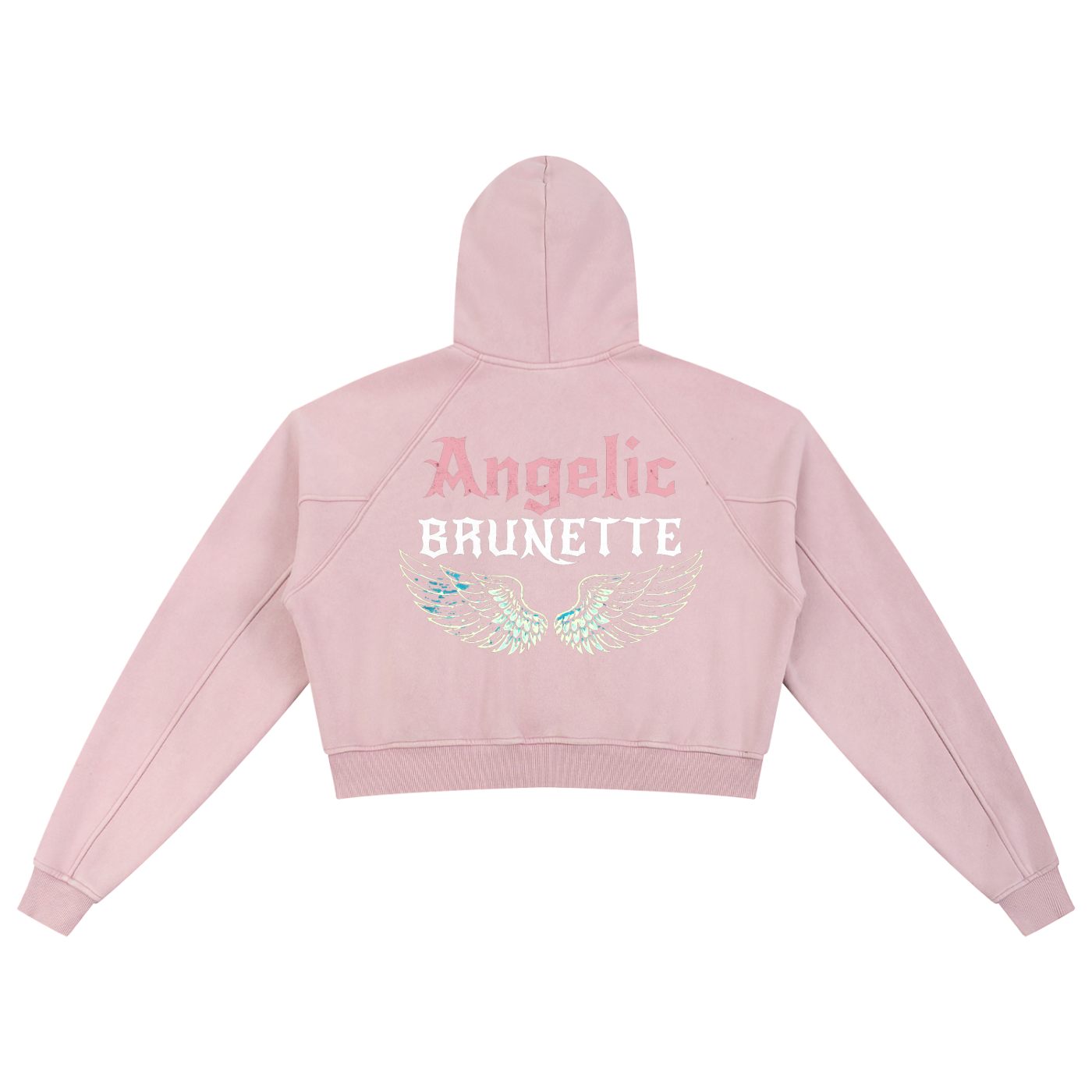 Back view of a pale pink cropped hoodie with hood up, featuring “Angelic Brunette” New Rocker font text and iridescent angel wings graphic printed across the back on a white background.
