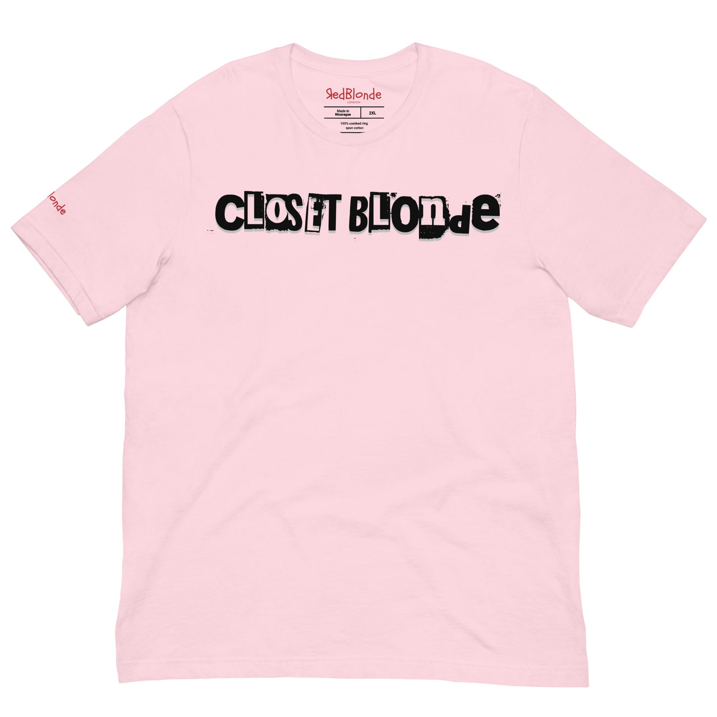 flatlay of a pale pink relaxed fit graphic t-shirt with 'Closet Blonde' in irregular black and white printing block style caps and lowercase lettering. Branded RedBlonde London in inside neck and right sleeve