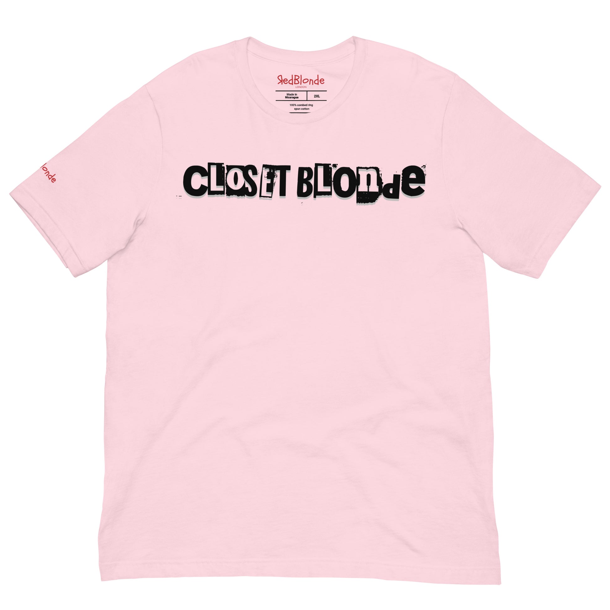 flatlay of a pale pink relaxed fit graphic t-shirt with 'Closet Blonde' in irregular black and white printing block style caps and lowercase lettering. Branded RedBlonde London in inside neck and right sleeve