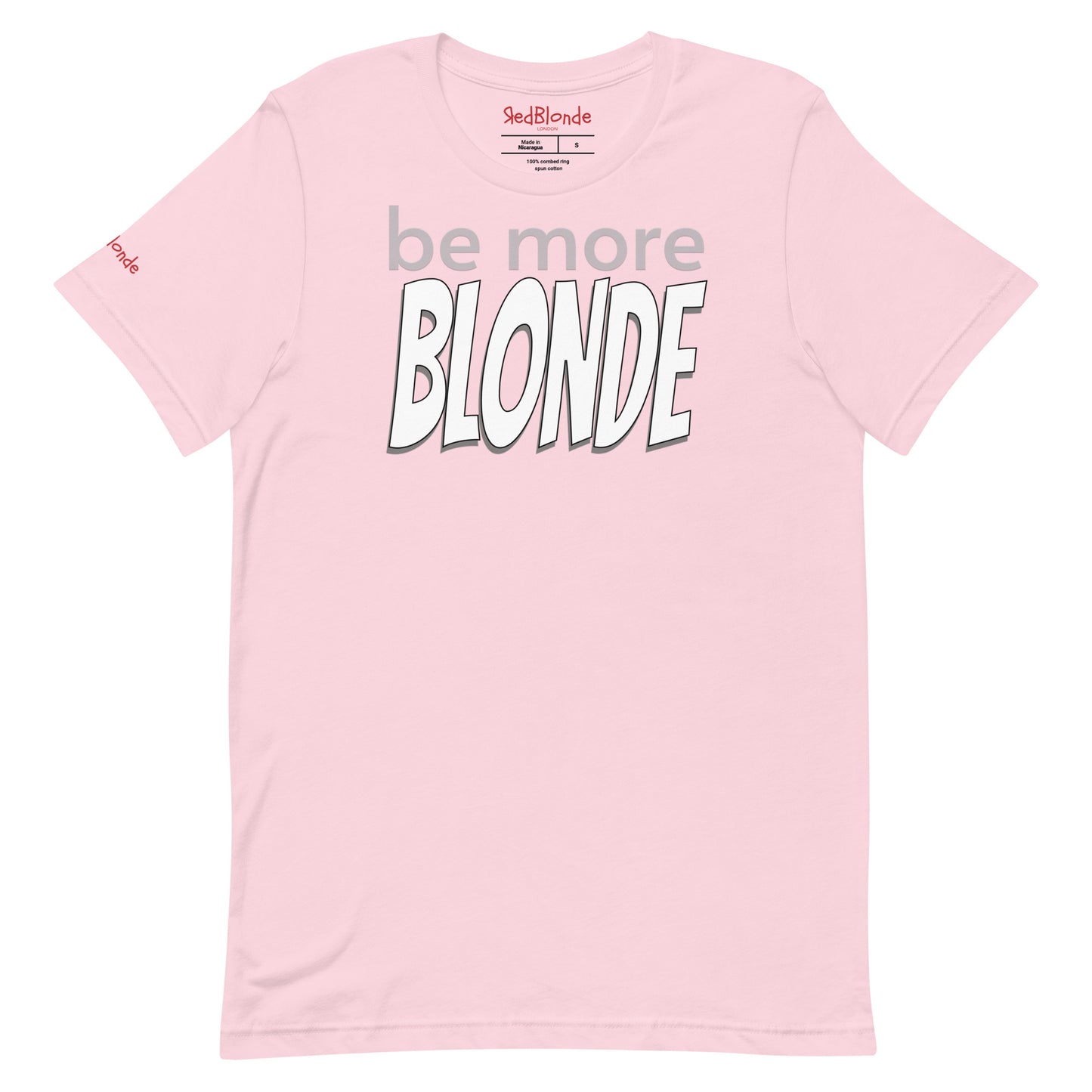 Flatlay of a pale pink unisex relaxed fit graphic t-shirt with the slogan 'be more Blonde' in grey and black outlined white 'bangers' text. Branded RedBlonde in red in inside neck and right sleeve