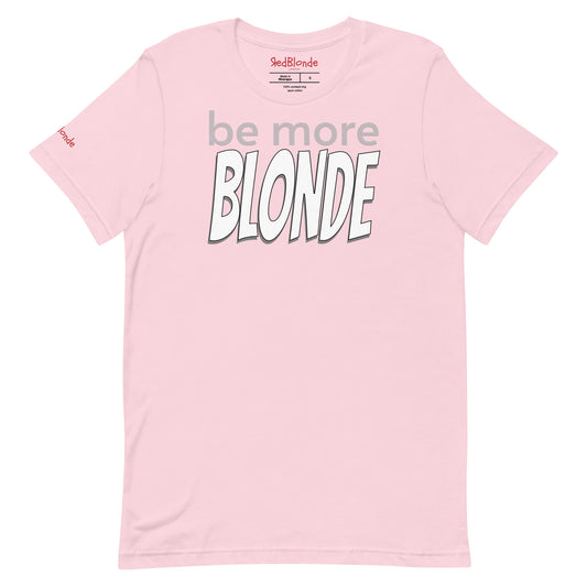 Flatlay of a pale pink unisex relaxed fit graphic t-shirt with the slogan 'be more Blonde' in grey and black outlined white 'bangers' text. Branded RedBlonde in red in inside neck and right sleeve