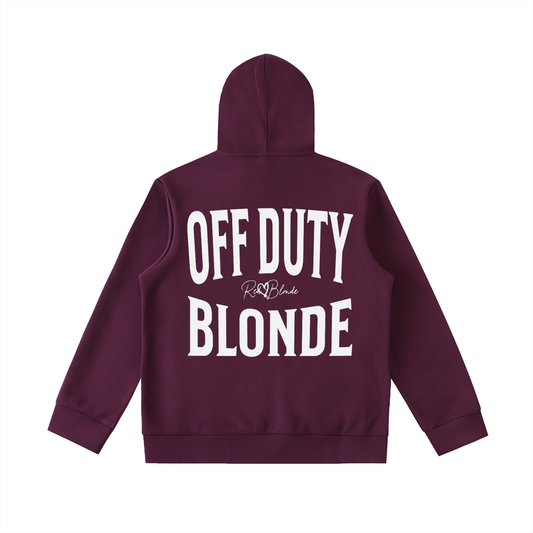 Plum oversized hoodie shown from the back on a white background, featuring large white “OFF DUTY BLONDE” Brookfield text with a small RedBlonde script logo between the words.