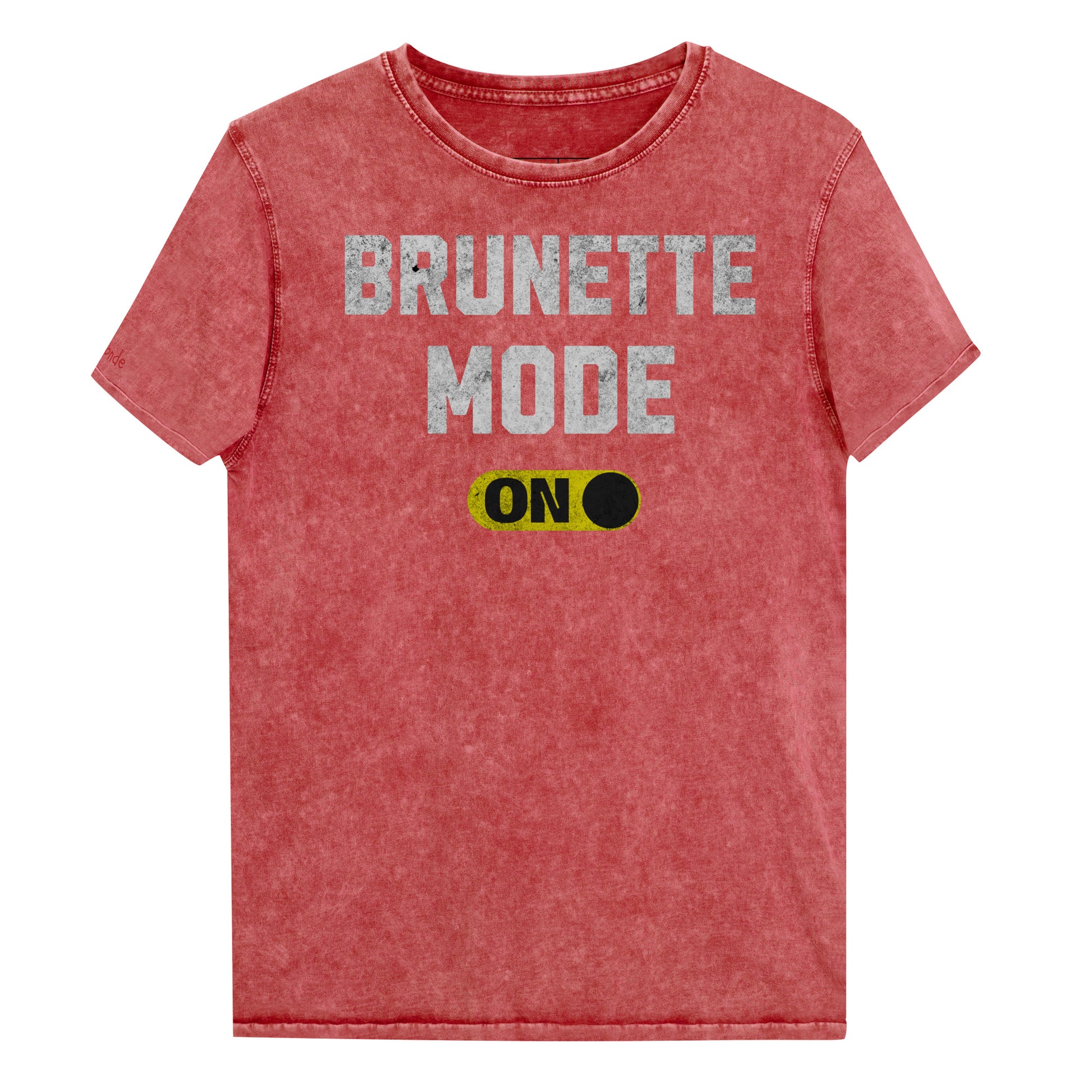 red denim-style unisex t-shirt with bold distressed white Univercity font reading “Brunette Mode” and a yellow on/off switch graphic in the “On” position beneath. The design includes subtle worn texture for a vintage look. Branded RedBlonde London in red on inside neck and right sleeve