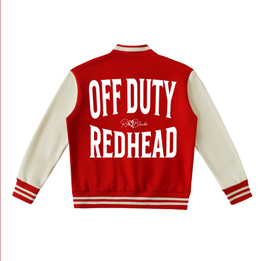 Red varsity-style jacket with cream sleeves and striped ribbed trims. The back features large white text reading “OFF DUTY REDHEAD” in Brookfield font with a small RedBlonde signature logo in the centre between the words