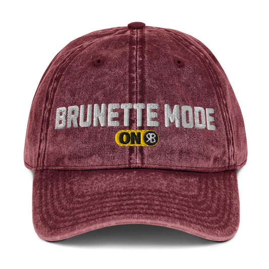 red denim cap with 'Brunette Mode ON' embroidered in white Univercity font with RB logo