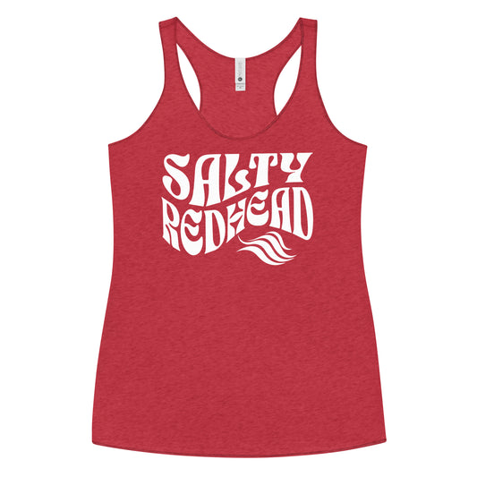 Flatlay of a red soft racerback tank t-shirt with 'Salty Redhead' play on words slogan in white retro wavy 70s font.  Branded RedBlonde London on reverse