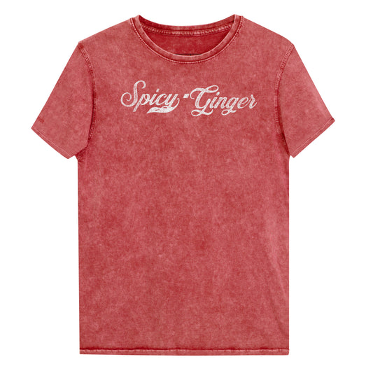 Flatlay of a red unisex loose-fit denim wash t-shirt with vintage Coca-Cola-inspired milkstore script in white reading ‘Spicy Ginger’ on the front. Branded RedBlonde on the inside neck and right shoulder in red