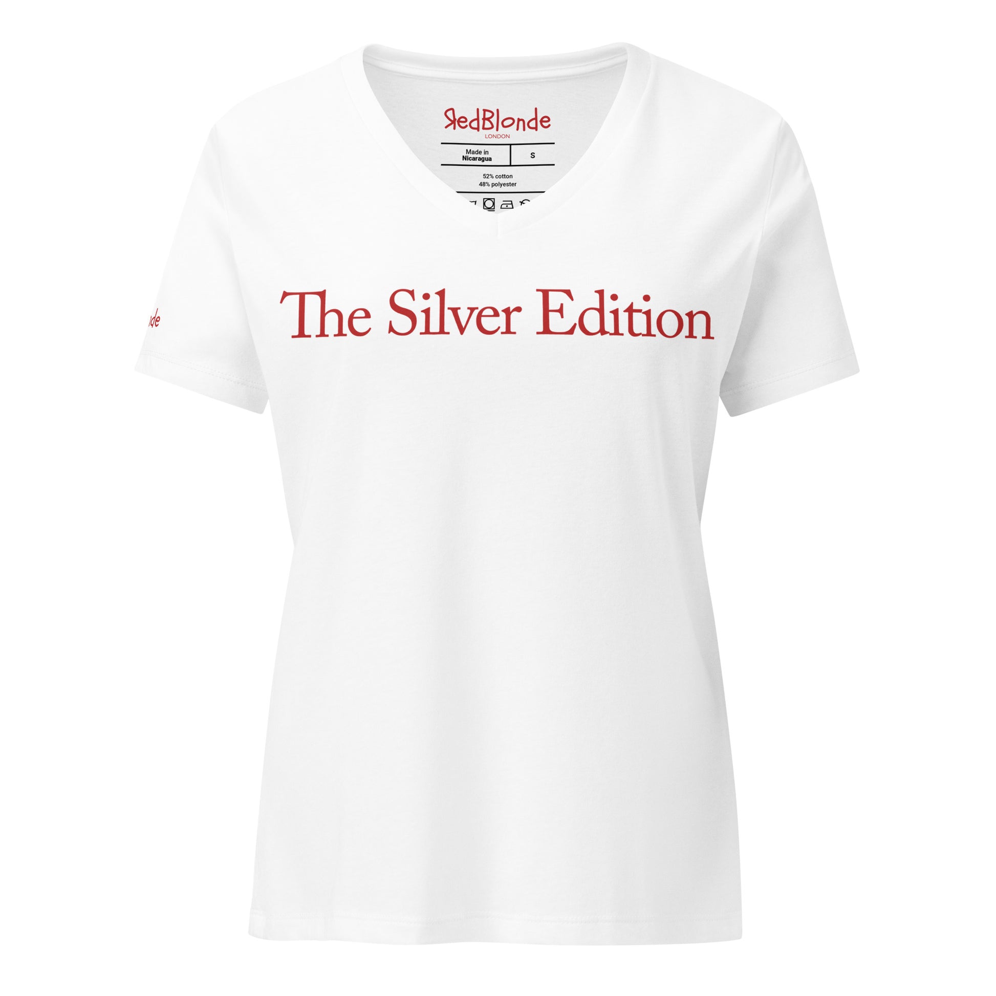 flatlay a relaxed but slightly fitted white v-neck t-shirt with the words 'The Silver Edition' in red. Branded RedBlonde in red on the inside neck and right sleeve