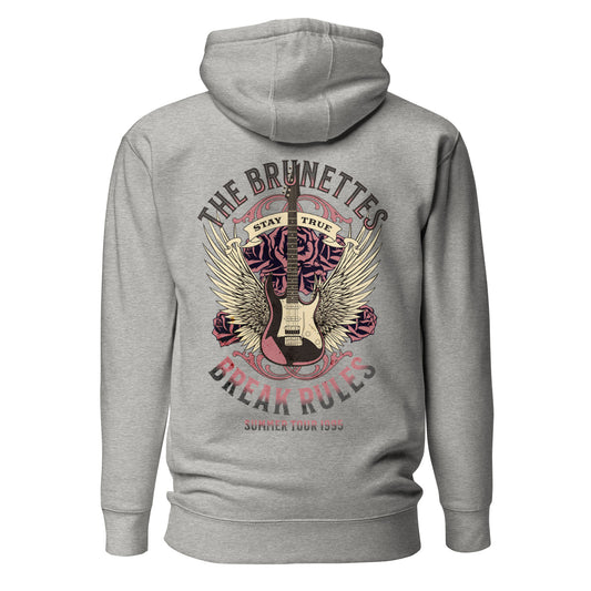 The reverse side of a grey 3 panel unisex classic hoodie with a burnt pink & beige graphic of a guitar with bird wings emerging from the side. The graphic features ‘THE BRUNETTES’ in Brookfield font above the guitar, ‘STAY TRUE’ across the top, and ‘BREAK RULES’ underneath. Branded RedBlonde London in inside neck and embroidered RedBlonde on front top right breast area. 