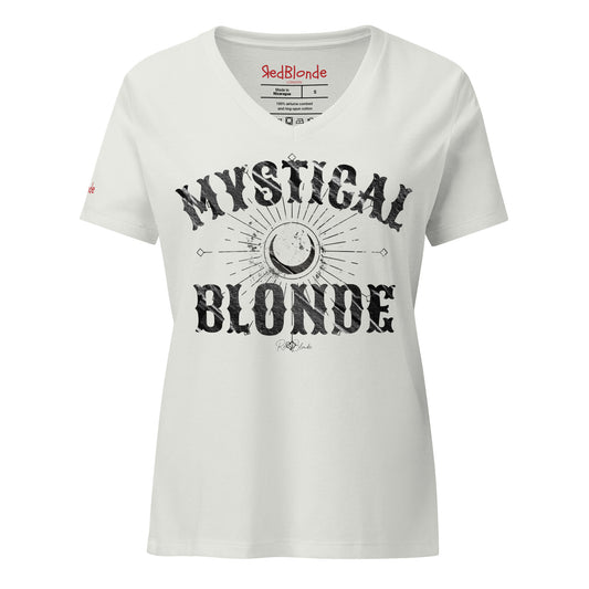 silver women’s V-neck T-shirt with bold black distressed Sancreek text reading “MYSTICAL BLONDE”. Between the words is a large crescent moon surrounded by radiating sunburst lines and small arrow-like details, creating a mystical, celestial design. The “RedBlonde” brand signature is printed below the word “BLONDE,” while the neckline shows the RedBlonde logo and garment care information in red and black. Redblonde branding on the right sleeve