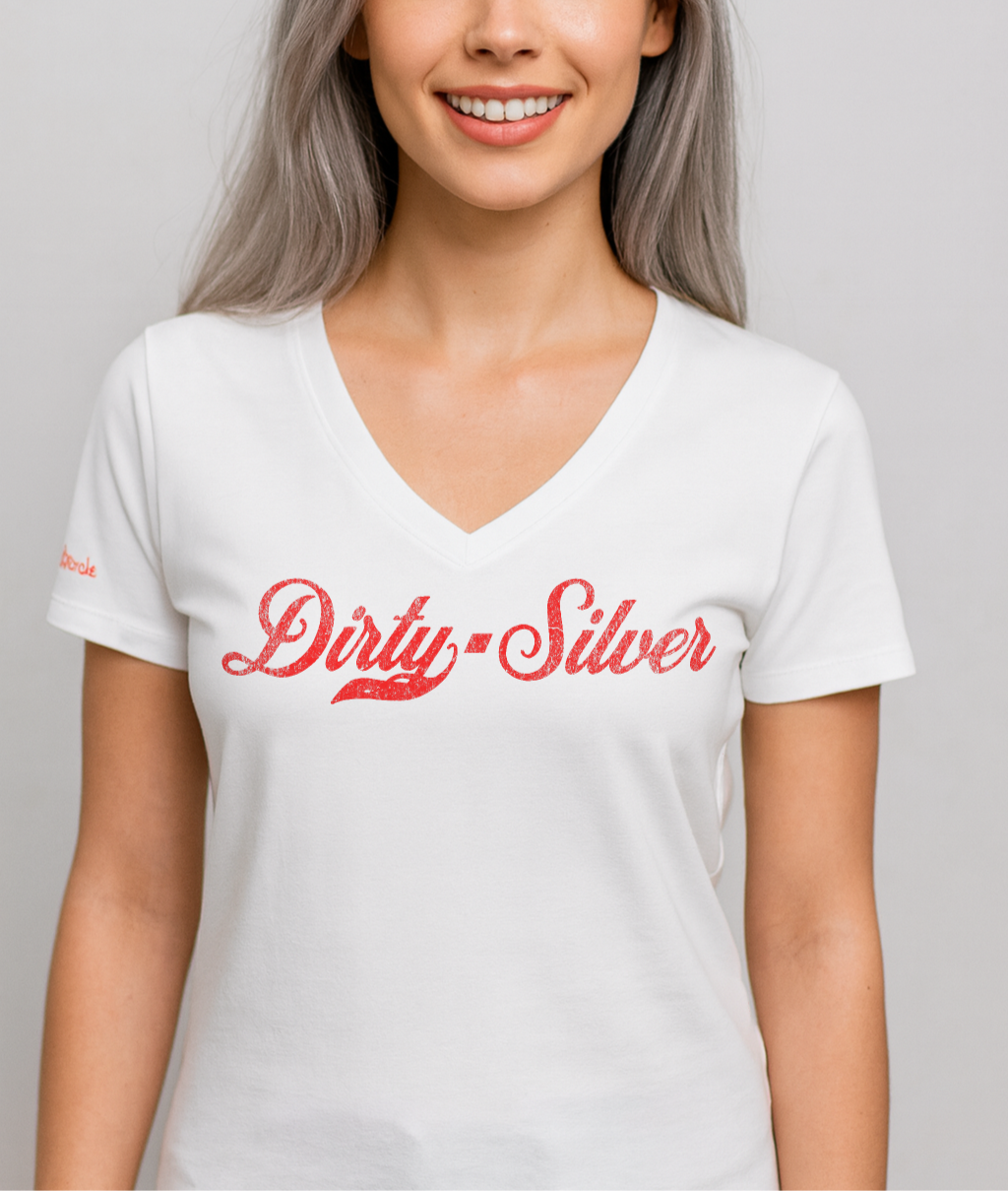 Silver model wears a white relaxed fit V-neck t-shirt with “Dirty Silver” written in vintage Coca-Cola red script on the front. branded redblonde on the inside neck and right shoulder in red 