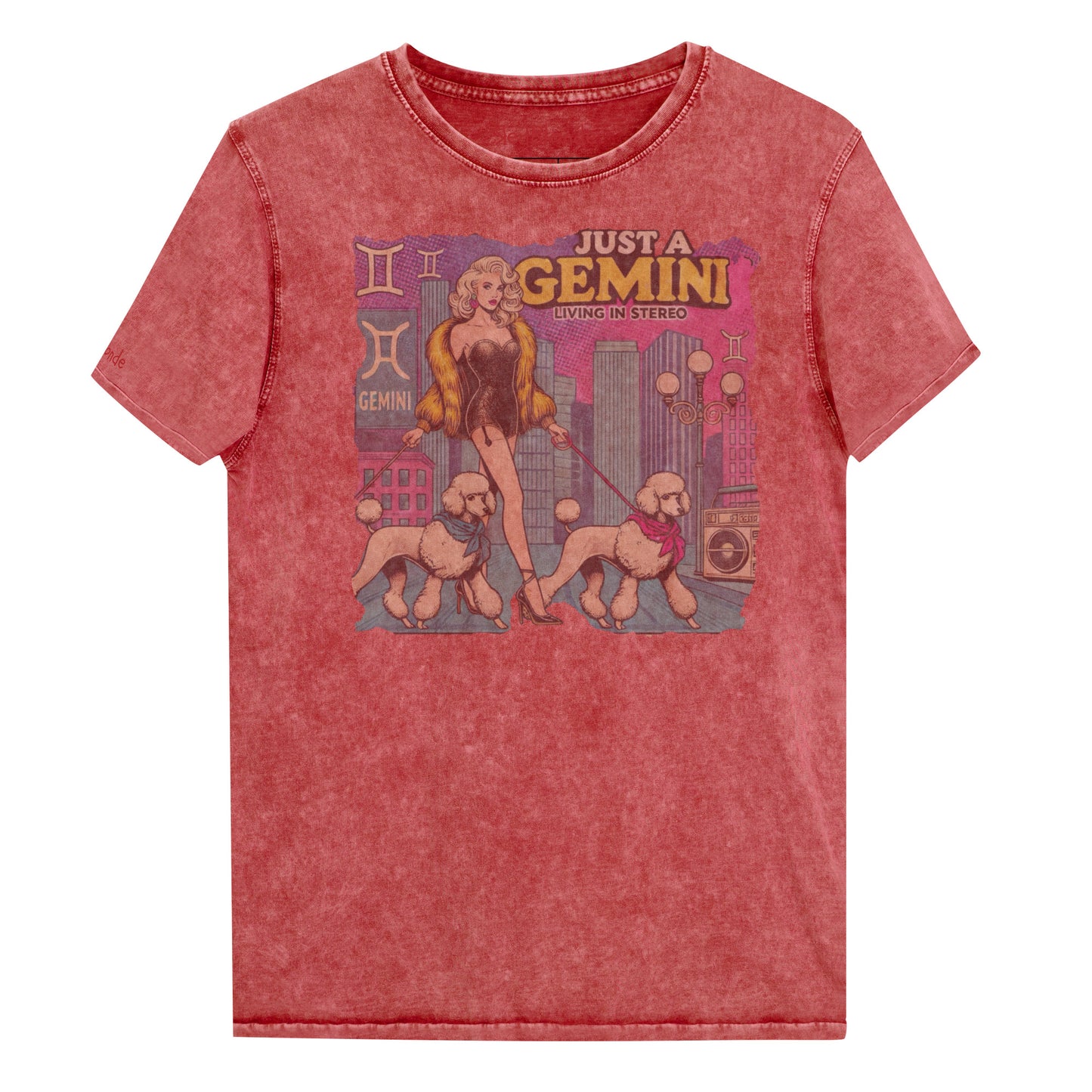 Flatlay of a unisex garnet red denim wash vintage t-shirt with a retro pop-art Gemini graphic featuring a blonde woman, in a short catsuit and fur coat walking two poodle dogs with neck scarfs with a city backdrop and a gettoblaster ‘Just a Gemini, Living in Stereo'. Branded RedBlonde on inside neck and right shoulder