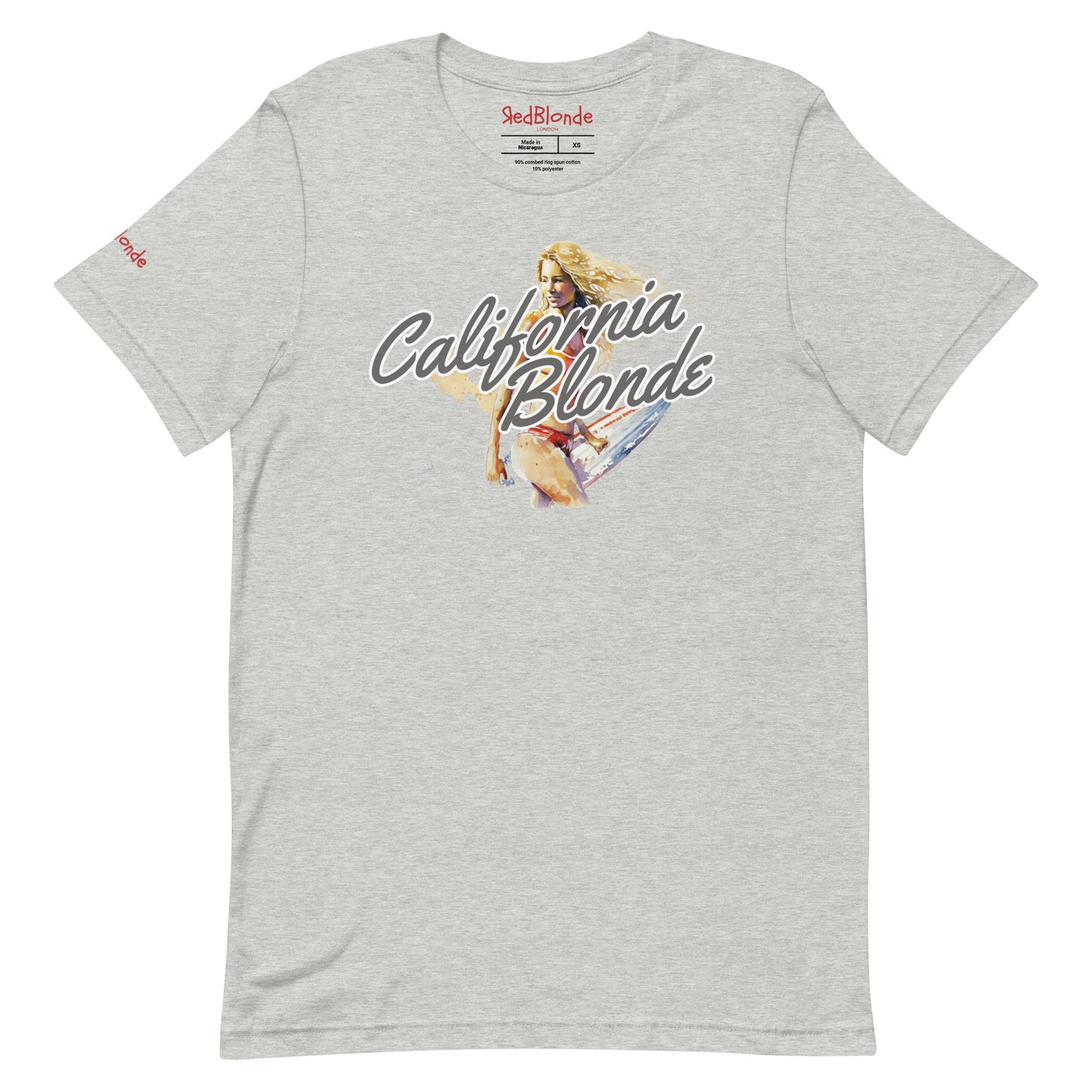 Flatlay of a unisex relaxed fit heather grey t-shirt with a graphic of a blonde surfer girl in a red bikini carrying a surfboard, saying ‘California Blonde’. Branded RedBlonde London in Red on inside neck and right sleeve 