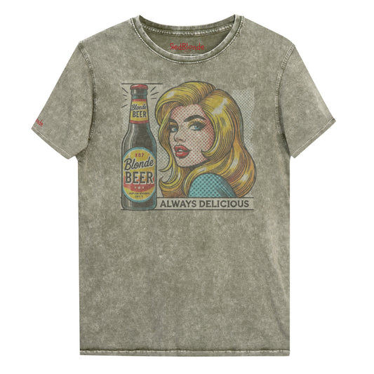Flatlay of a unisex vintage army green denim wash t-shirt featuring a pop-art graphic of the head and shoulders of a Blonde woman next to a bottle of Beer, labelled Blonde Beer, Always Delicious. branded RedBlonde in red on inside neck and right sleeve 