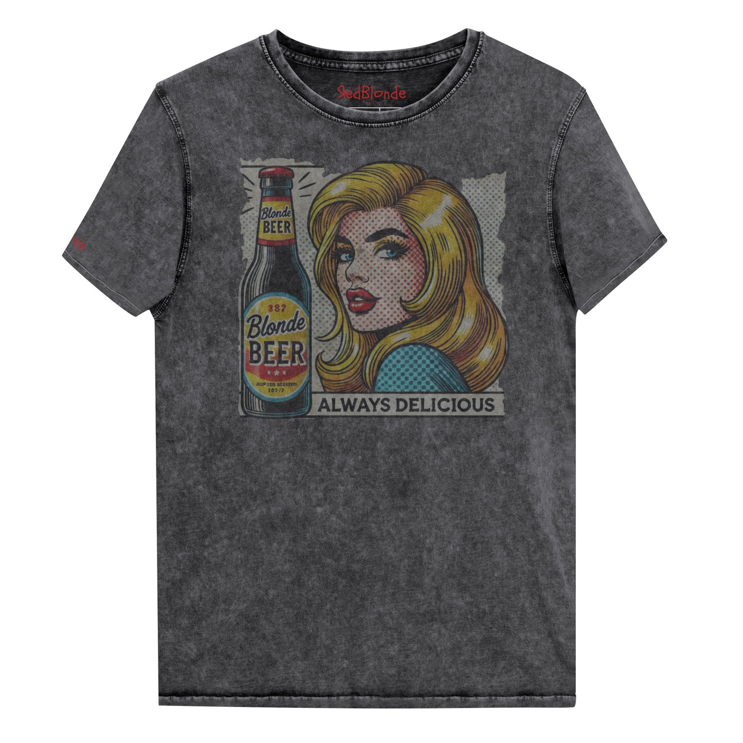 Flatlay of a unisex vintage black denim wash t-shirt featuring a pop-art graphic of the head and shoulders of a Blonde woman next to a bottle of Beer, labelled Blonde Beer, Always Delicious. branded RedBlonde in red on inside neck and right sleeve 