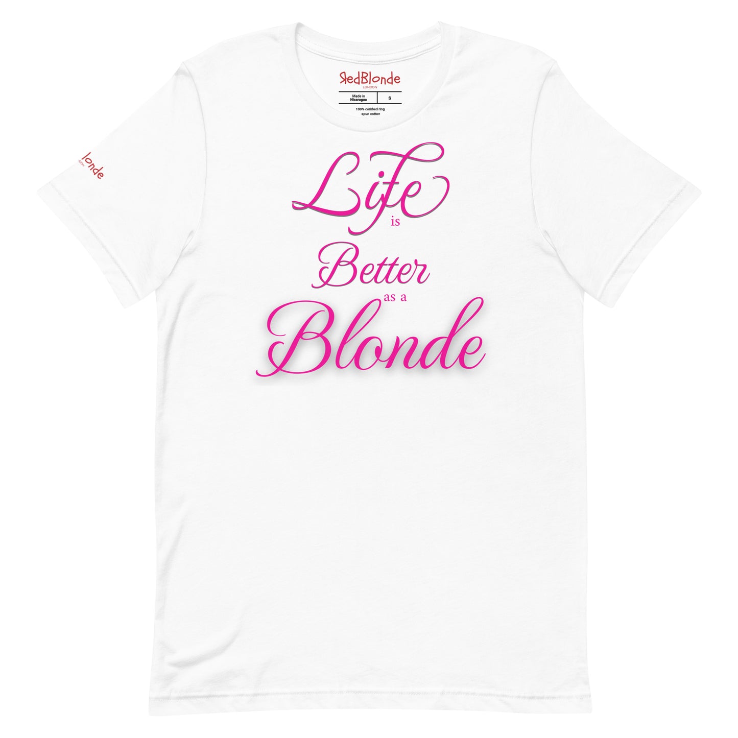 Flatlay of a unisex white relaxed fit graphic t-shirt with the slogan 'life is better as a blonde' in pink 'monte carlo' font, like slanted handwriting. Branded RedBlonde London in red on inside neck and right sleeve 