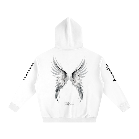 Back view of a white oversize hoodie featuring large silver angel wings printed across the back, with white RedBlonde signature logo underneath. Each sleeve features gothic New Rockstar font graphic text  one sleeve says 'Angelic' and the other 'Raven' 
