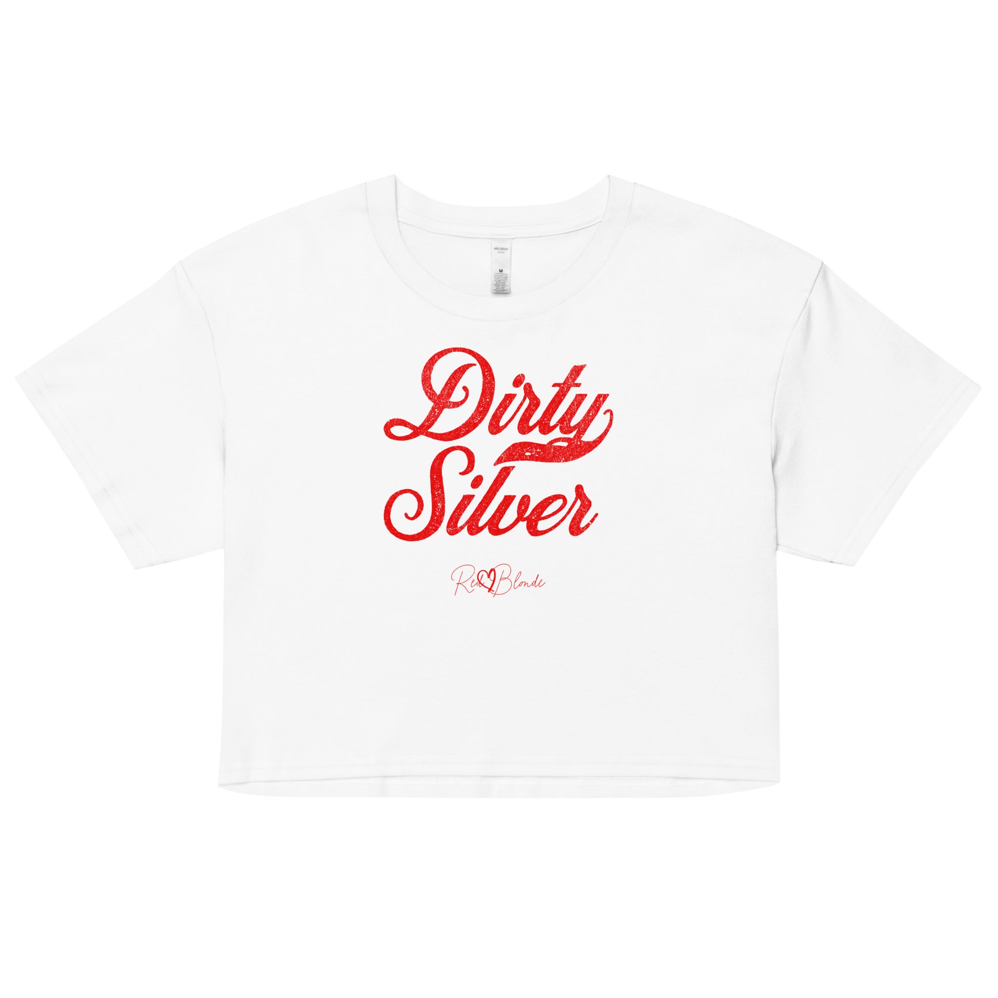 white women’s crop top featuring the phrase “Dirty Silver” in bold, red milkstore vintage-style script across the chest. Below the phrase, the brand name “RedBlonde” is printed in a smaller, elegant handwritten font.