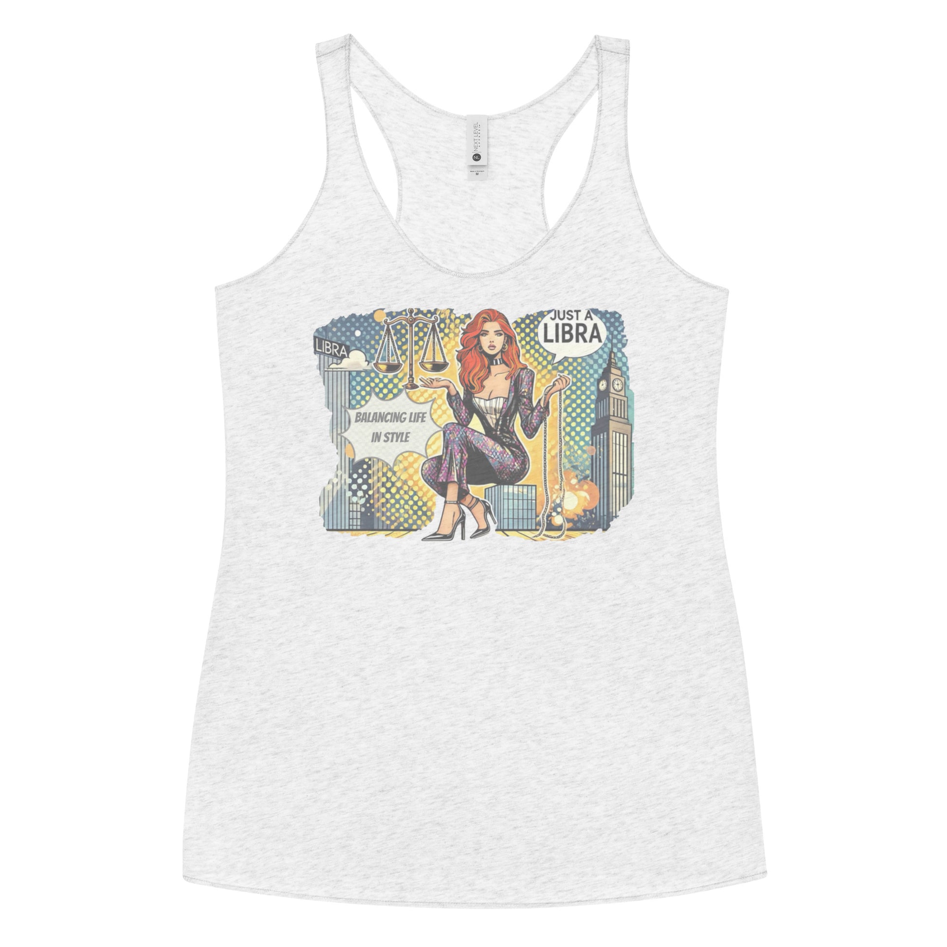 Flatlay of a heather white soft racerback tank t-shirt with a retro pop-art Libra graphic featuring a redhead woman, scales, and a city backdrop, captioned ‘Just a Libra, Balancing Life in Style’.