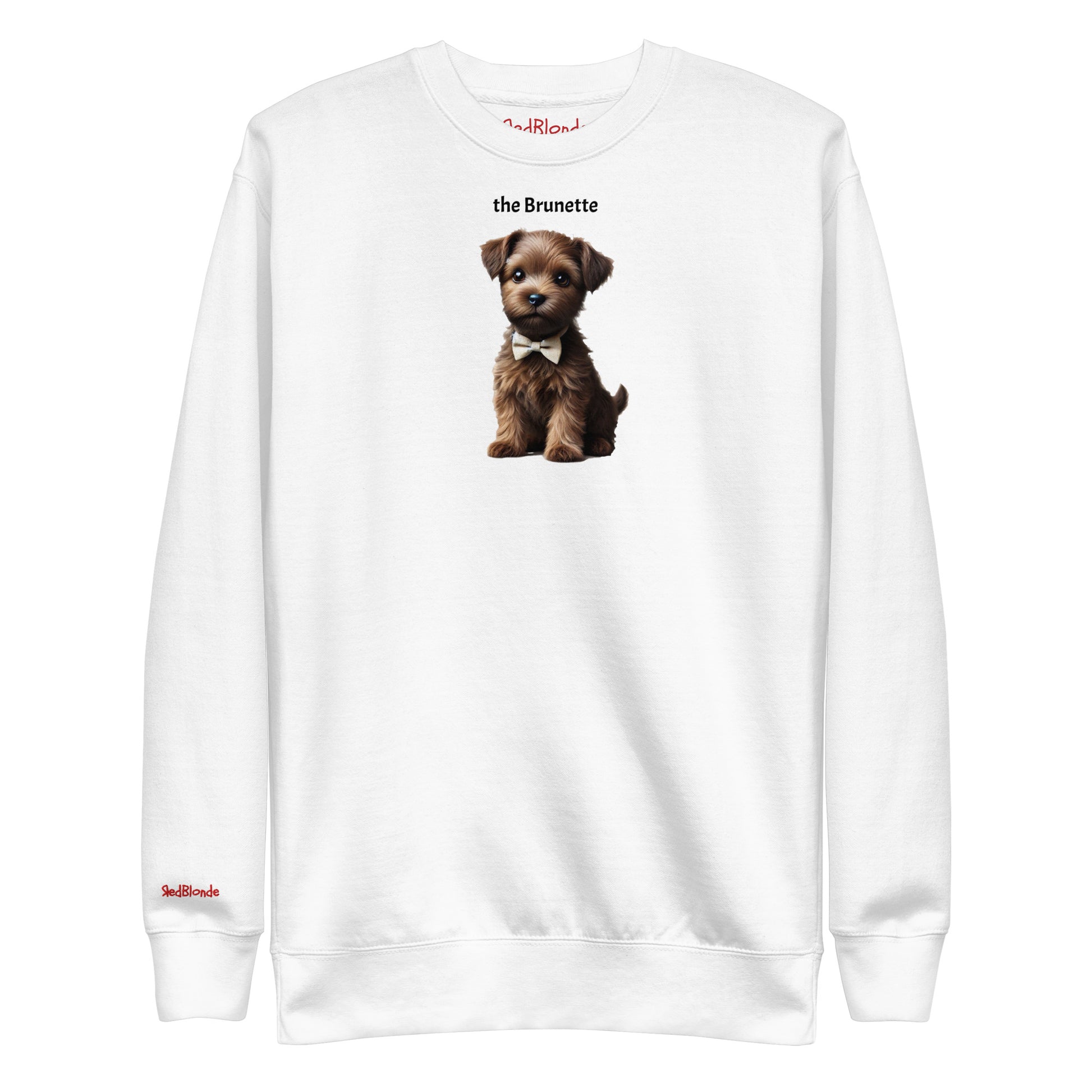 Flatlay of white unisex sweatshirt with a cute graphic of a Brunette puppy wearing a bow-tie and the words 'the Brunette' linking to Brunette hair. Branded RedBlonde in red on inside neck and right cuff