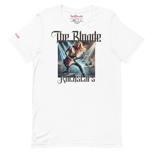 A white unisex t-shirt with a graphic of a blonde female rock guitarist on stage with a drummer in the background, illuminated by stage lights. The text ‘The Blonde Rockstars’ is in bold, metallic avalen rekas font above and below the image. Branded RedBlonde London in red on the inside neck and right sleeve.